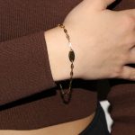 Bracciale oro giallo con targhetta laterale