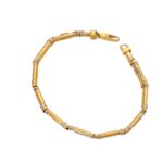 BRACCIALE DUE ORI SEMIRIGIDO CON ZIRC. BIANCHI